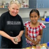 Pottery instructor with a student