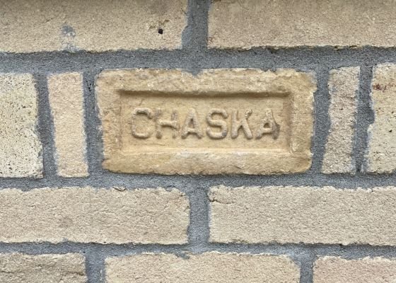 Bricks with one in the center with Chaska written on it