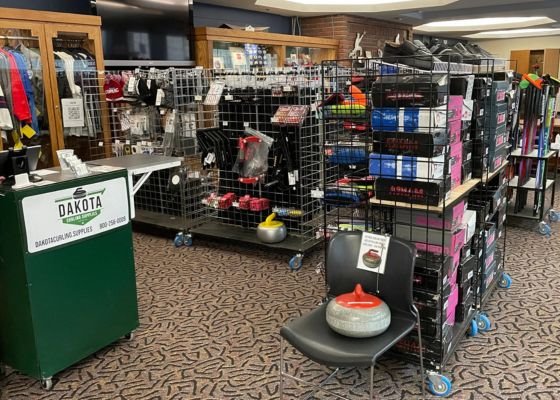 Displays of curling equipment and gear