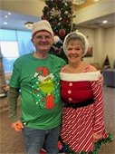Smiling Couple.  Dressed in festive holiday clothes. Spud Bar is on December 20 at 11:45am. $10