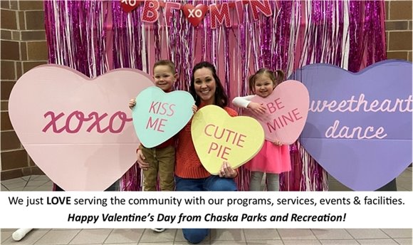 Mom and two kids holding hearts- Happy Valentine's Day from Chaska Parks and Recreation