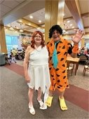 A couple dressed as Fred and Wilma Flintstone for Lodge Halloween Party.