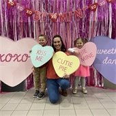 Images of family holding paper hearts