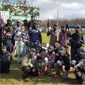 Group of teenagers playing paintball