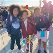 Picture of three girls smiling