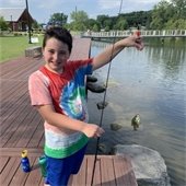 Picture of boy catching a fish