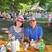 Picture of two people at a picnic
