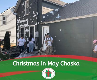 Volunteers painting a house, Christmas in May Chaska